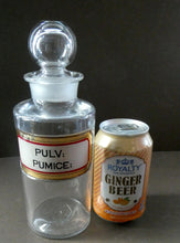 Load image into Gallery viewer, Large Antique Clear Glass Chemist Bottle. PULV: PUMICE: with Original Foil Label and Ball Stopper
