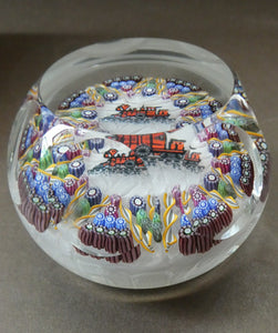 Vintage 1980s PERTHSHIRE PAPERWEIGHT. Millefiori Ground with Train Motif (PP 56)