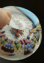 Load image into Gallery viewer, Vintage 1980s PERTHSHIRE PAPERWEIGHT. Millefiori Ground with Train Motif (PP 56)
