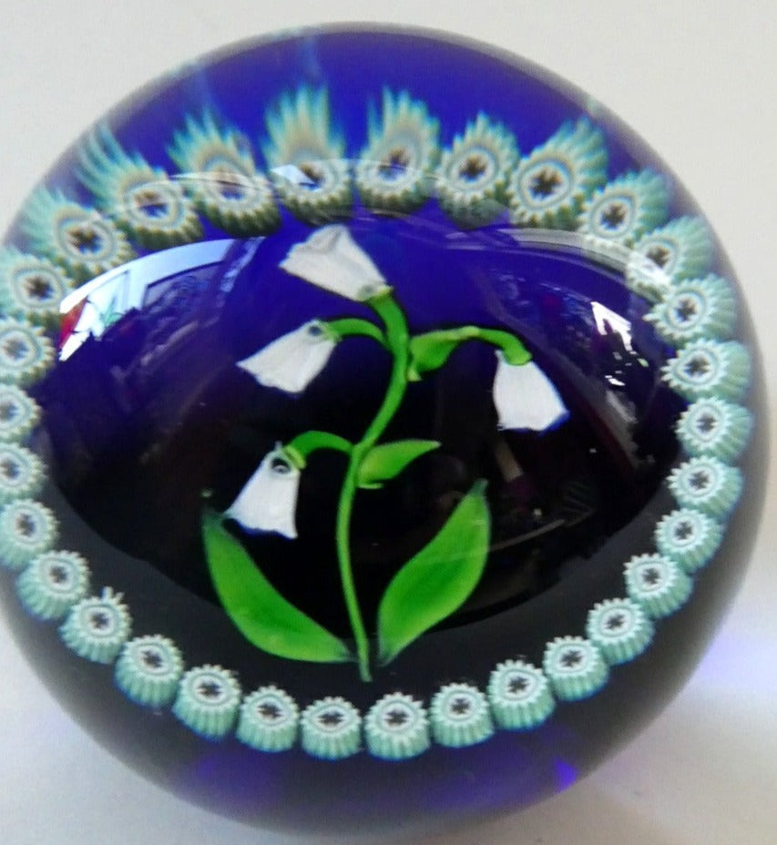 Vintage Scottish Paperweight . Lily of the Valley (MAY) White Lampwork Flower on Dark Blue Base