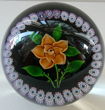 Load image into Gallery viewer, 2000 Caithness Glass Paperweight with Lampwork Flower. 100th Birthday of the Queen Mother
