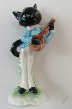 Load image into Gallery viewer, Fabulous &amp; Cute. 1960s Goebel Figurine of a Little Comical Black Cat Playing a Banjo. Designed by Albert Staehle
