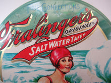 Load image into Gallery viewer, Vintage American Toffee Tin. FRALINGER&#39;S Salt Water Taffy. Atlantic City Image
