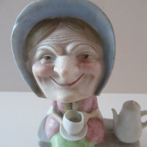 Antique Porcelain Nodder Figurine by Schafer & Vater. Old Lady in Garden Drinking Tea 
