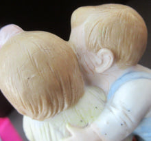 Load image into Gallery viewer, Porcelain Match Holder by Schafer &amp; Vater. GOOGLE EYED COUPLE EMBRACING
