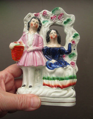 Antique Miniature Staffordshire Figurine. Couple Under a Fruiting  Vine