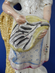 19th Century Staffordshire Figurine. LARGE Antique Model of a Fishwife with a Basket of Fish and Fishing Net: 13 1/2 inches