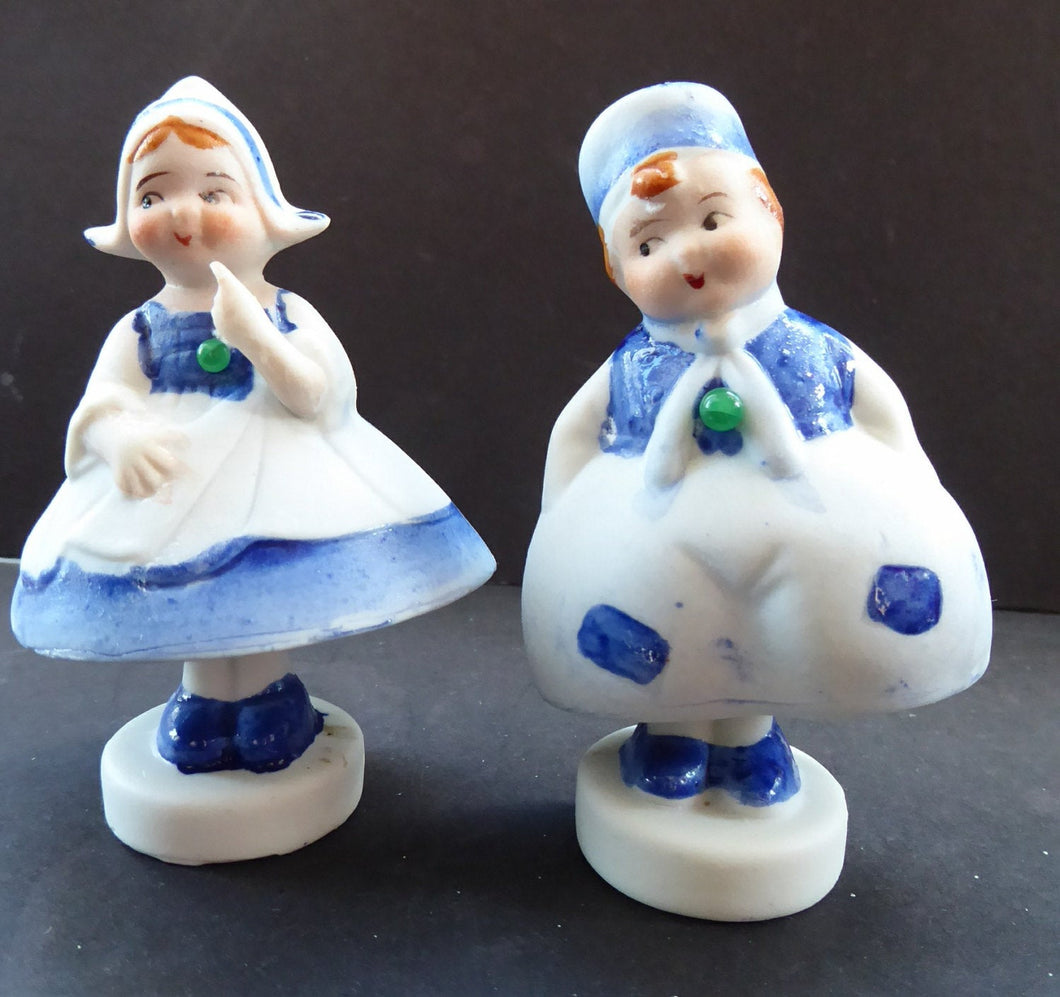 Japanese Bisque Nodder Figures of a Little Vintage DUTCH Boy and Girl. They wobble about from side to side, as if dancing!