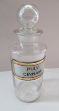 Load image into Gallery viewer, Antique Chemist Bottle with Ball Stopper and Foil Glass Covered Label

