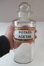 Load image into Gallery viewer, Antique Chemist Bottle with Ball Stopper and Foil Glass Covered Label
