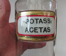 Load image into Gallery viewer, Antique Chemist Bottle with Ball Stopper and Foil Glass Covered Label
