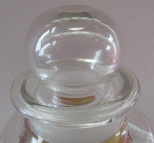 Load image into Gallery viewer, Antique Chemist Bottle with Ball Stopper and Foil Glass Covered Label
