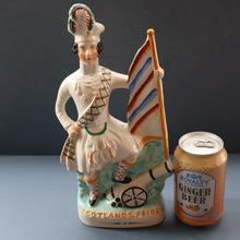 Load image into Gallery viewer, CRIMEAN WAR Interest. 1850s Antique Staffordshire Figurine of a Scottish Soldier with Raised Flag. SCOTLAND'S PRIDE
