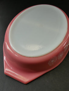 Two 1950s Vintage PYREX GAEITY Serving Dishes. One Oval Pink with Daisy Pattern. One Oblong Black Dish with Snowflake Pattern