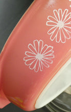 Load image into Gallery viewer, Two 1950s Vintage PYREX GAEITY Serving Dishes. One Oval Pink with Daisy Pattern. One Oblong Black Dish with Snowflake Pattern
