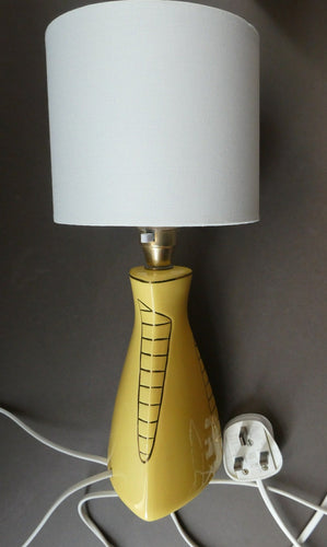 Vintage 1950s Pottery Table Lamp with White Drum Shade. Yellow Triangular Shape with Gold Decoration