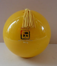 Load image into Gallery viewer, 1960s KIKU Yellow Plastic Dusting Powder Ball. With original fluffy puff and sealed Faberge talcum powder
