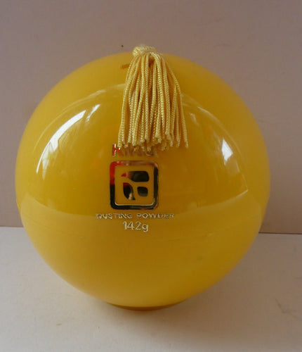 1960s KIKU Yellow Plastic Dusting Powder Ball. With original fluffy puff and sealed Faberge talcum powder