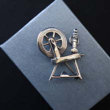 Load image into Gallery viewer, SCOTTISH SILVER Ortak Vintage 1970s Spinning Wheel Brooch. Designed by Malcolm Gray
