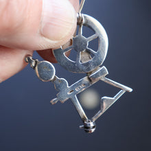 Load image into Gallery viewer, SCOTTISH SILVER Ortak Vintage 1970s Spinning Wheel Brooch. Designed by Malcolm Gray

