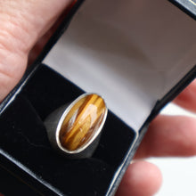 Load image into Gallery viewer, Vintage 1977 Hallmarked Space Age Silver Rings with Oval Tiger&#39;s Eye Inclusion. Size O

