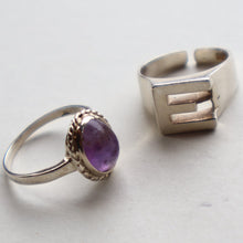Load image into Gallery viewer, TWO Vintage Child&#39;s Size Silver Rings; One with the Initial &quot;E&quot; and the other (smaller) with an Amethyst.
