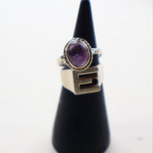 Load image into Gallery viewer, TWO Vintage Child&#39;s Size Silver Rings; One with the Initial &quot;E&quot; and the other (smaller) with an Amethyst.

