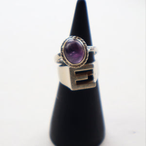 TWO Vintage Child's Size Silver Rings; One with the Initial "E" and the other (smaller) with an Amethyst.