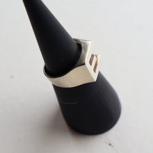 Load image into Gallery viewer, TWO Vintage Child&#39;s Size Silver Rings; One with the Initial &quot;E&quot; and the other (smaller) with an Amethyst.

