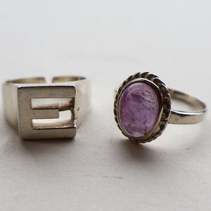 TWO Vintage Child's Size Silver Rings; One with the Initial "E" and the other (smaller) with an Amethyst.