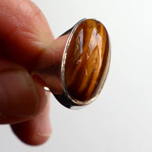 Load image into Gallery viewer, Vintage 1977 Hallmarked Space Age Silver Rings with Oval Tiger&#39;s Eye Inclusion. Size O
