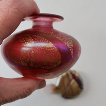 Load image into Gallery viewer, Early Vintage ISLE OF WIGHT Perfume Bottle (Golden Peacock in Pink) with Lollipop Stopper. 4 1/4 inches 
