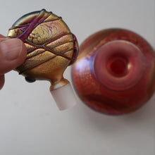 Load image into Gallery viewer, Early Vintage ISLE OF WIGHT Perfume Bottle (Golden Peacock in Pink) with Lollipop Stopper. 4 1/4 inches 
