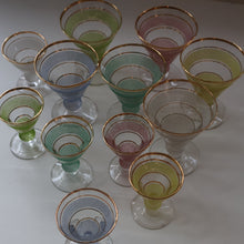 Load image into Gallery viewer, Selection of 1950s Harlequin Footed Drinking / Cocktail Glasses. Conical Shape with Frosted Pastel Stripes and Gold Gilt Embellishments
