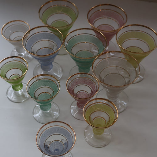 Selection of 1950s Harlequin Footed Drinking / Cocktail Glasses. Conical Shape with Frosted Pastel Stripes and Gold Gilt Embellishments