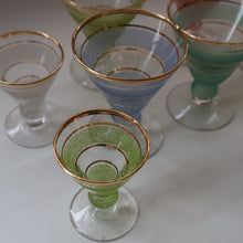 Load image into Gallery viewer, Selection of 1950s Harlequin Footed Drinking / Cocktail Glasses. Conical Shape with Frosted Pastel Stripes and Gold Gilt Embellishments
