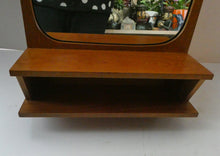 Load image into Gallery viewer, 1960s DANISH Pedersen &amp; Hansen (P&amp;H) wall mirror in a teak wooden frame with a small integrated shelf
