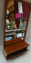 Load image into Gallery viewer, 1960s DANISH Pedersen &amp; Hansen (P&amp;H) wall mirror in a teak wooden frame with a small integrated shelf
