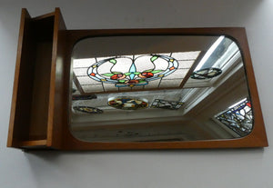 1960s DANISH Pedersen & Hansen (P&H) wall mirror in a teak wooden frame with a small integrated shelf
