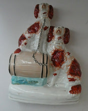 Load image into Gallery viewer, Antique Staffordshire King Charles Spaniel Dogs Sitting on Top of a Barrel. Genuine Victorian Figurine
