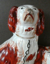 Load image into Gallery viewer, Antique Staffordshire King Charles Spaniel Dogs Sitting on Top of a Barrel. Genuine Victorian Figurine

