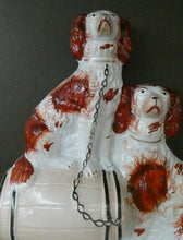 Load image into Gallery viewer, Antique Staffordshire King Charles Spaniel Dogs Sitting on Top of a Barrel. Genuine Victorian Figurine

