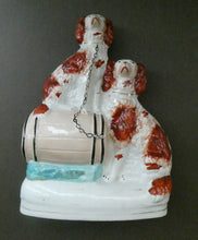 Load image into Gallery viewer, Antique Staffordshire King Charles Spaniel Dogs Sitting on Top of a Barrel. Genuine Victorian Figurine
