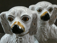 Load image into Gallery viewer, Antique Pair of Staffordshire Chimney Spaniels or Wally Dogs. 11 inches. Yellow Eyes
