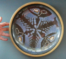 Load image into Gallery viewer, Large 1970s Round Shallow Plate. Davey Pottery, Castle Douglas, Kirkcudbrightshire. Abstract Design with Strange Creatures
