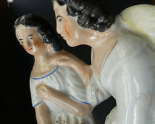 Load image into Gallery viewer, Antique 19th Century Staffordshire Figurine. Couple with a Nest 
