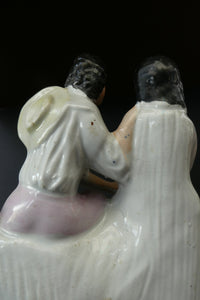 Antique 19th Century Staffordshire Figurine. Couple with a Nest 