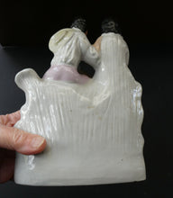 Load image into Gallery viewer, Antique 19th Century Staffordshire Figurine. Couple with a Nest 
