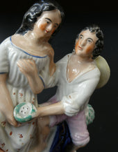 Load image into Gallery viewer, Antique 19th Century Staffordshire Figurine. Couple with a Nest 
