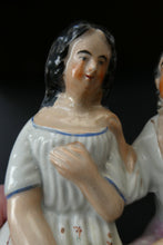 Load image into Gallery viewer, Antique 19th Century Staffordshire Figurine. Couple with a Nest 
